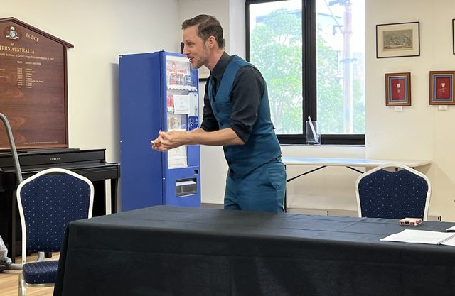 Stuart Lightbody performing during his lecture at the Subiaco Freemasons building (Western Wand photo)